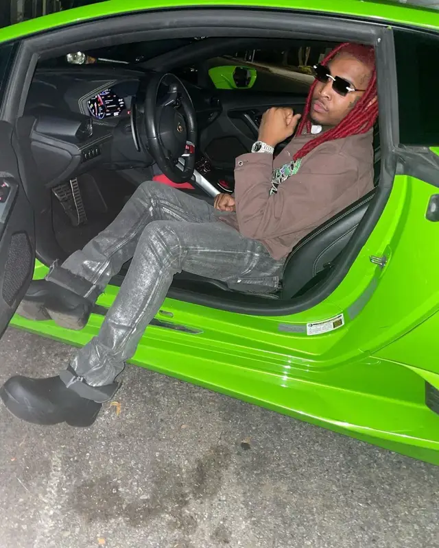 Lil Keed outfit in Who Decides War, Louis Vuitton, and James Oro, 2022