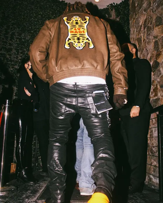Gunna outfit in Louis Vuitton, Purple Brand, and Palm Angels, 2022