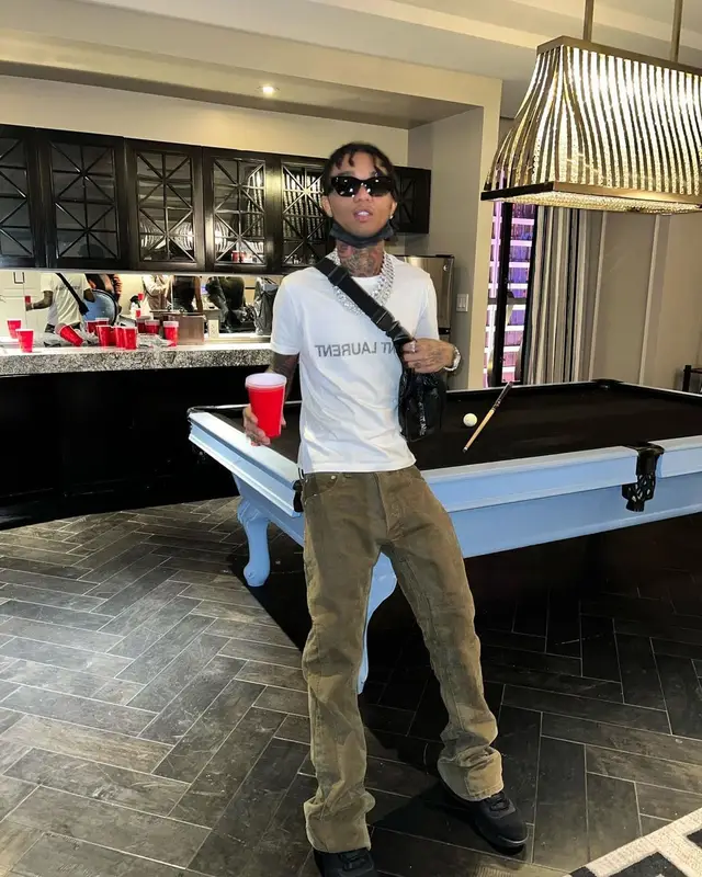 Swae Lee outfit in Dior, Saint Laurent, and Celine, 2022