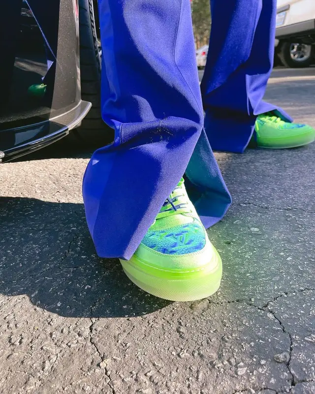 Tyga outfit in Louis Vuitton, 2022