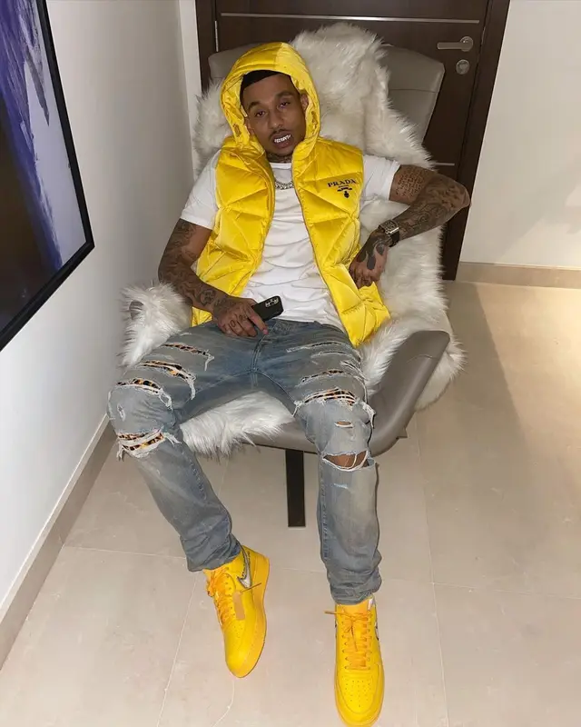 Fredo outfit in Prada, Amiri, and Nike, 2022