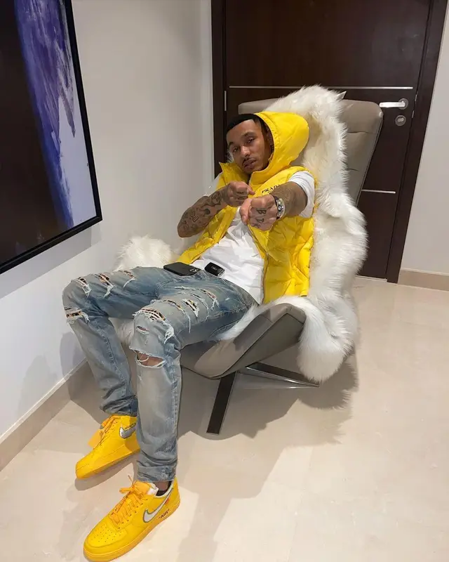 Fredo outfit in Prada, Amiri, and Nike, 2022