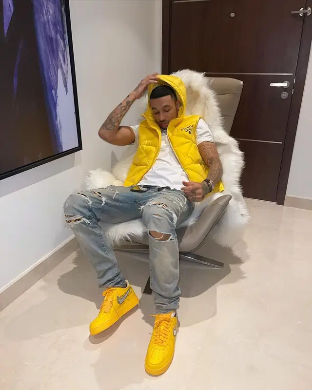 Fredo outfit in Prada, Amiri, and Nike, 2022