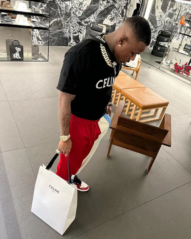 DaBaby outfit in Dolce & Gabbana, Nike, and Celine, 2022