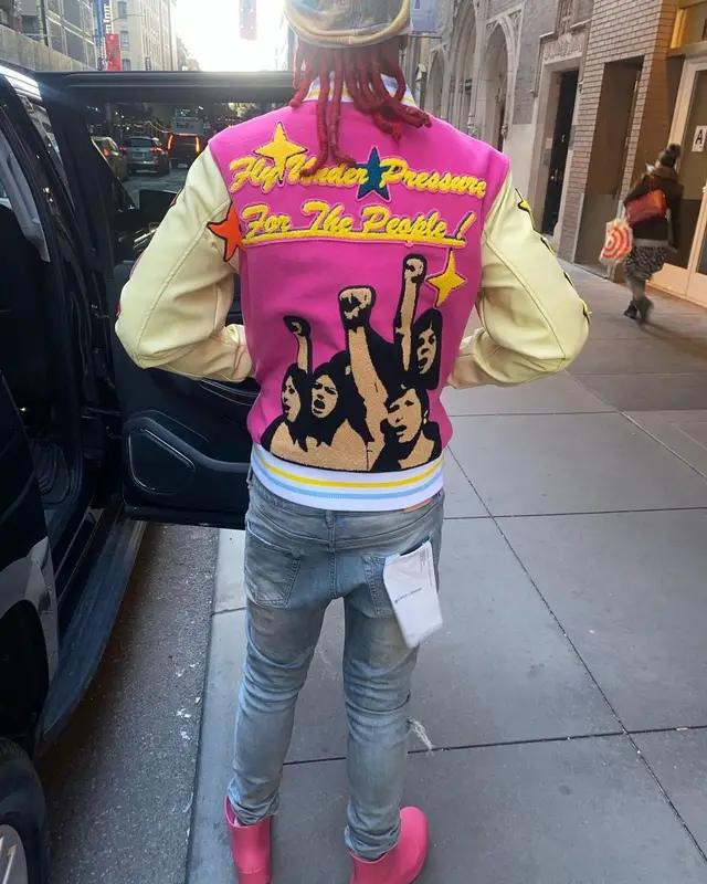 Lil Keed outfit in Purple Brand, Bottega Veneta, and Cartier, 2022