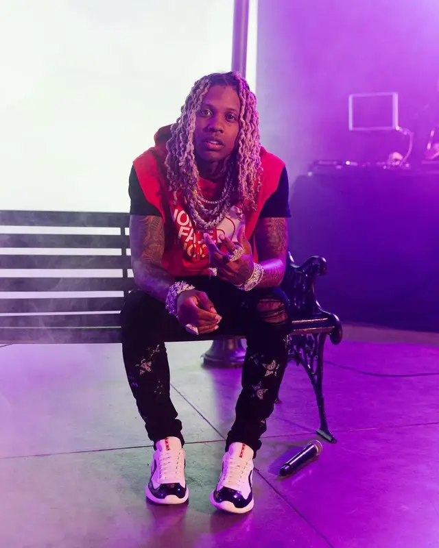 Lil Durk outfit in Gucci, Amiri, and The North Face, 2022