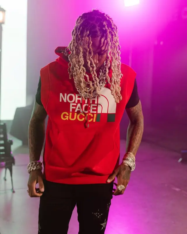Lil Durk outfit in Gucci, Amiri, and The North Face, 2022