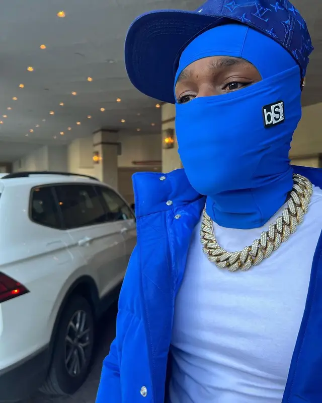 DaBaby outfit in Alexander McQueen, Amiri, and Louis Vuitton, 2022