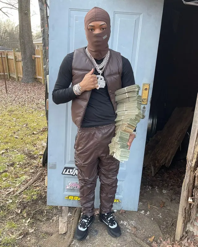 Lil Migo outfit in Dior and Sole et. Al, 2022