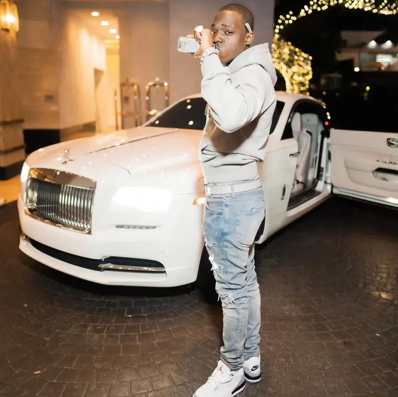 Bobby Shmurda outfit in Dior, Amiri, and Jordan, 2022
