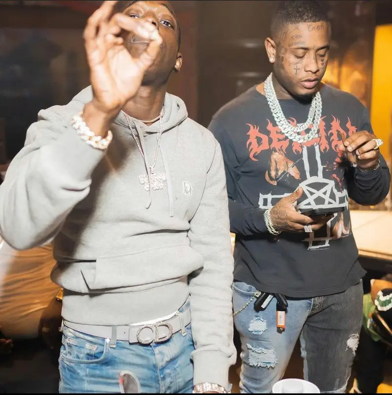 Bobby Shmurda outfit in Dior, Amiri, and Jordan, 2022
