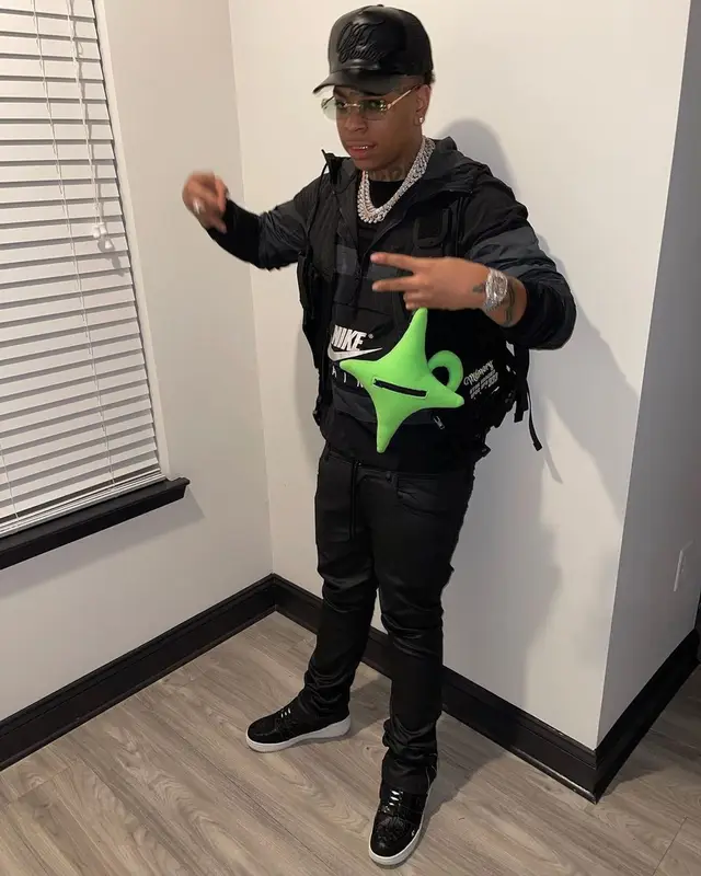 Lil Gotit outfit in Nike, Bape, and Freebandz, 2022