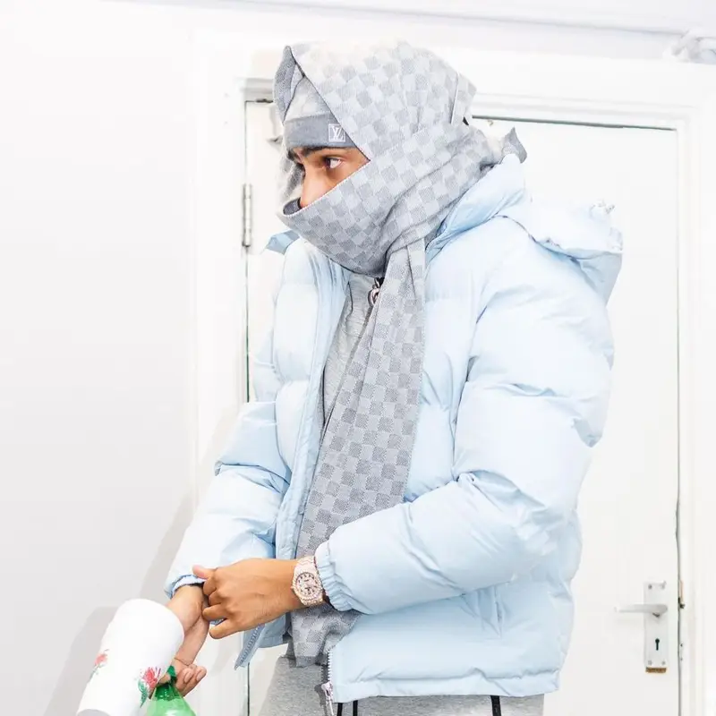 AJ Tracey outfit in Trapstar, Louis Vuitton, and Sprite, 2021