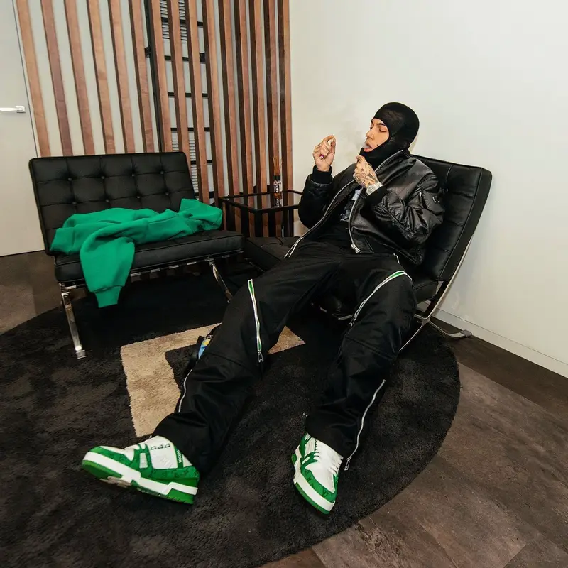 Sfera Ebbasta outfit in Prada, Raf Simons, and Louis Vuitton, 2022