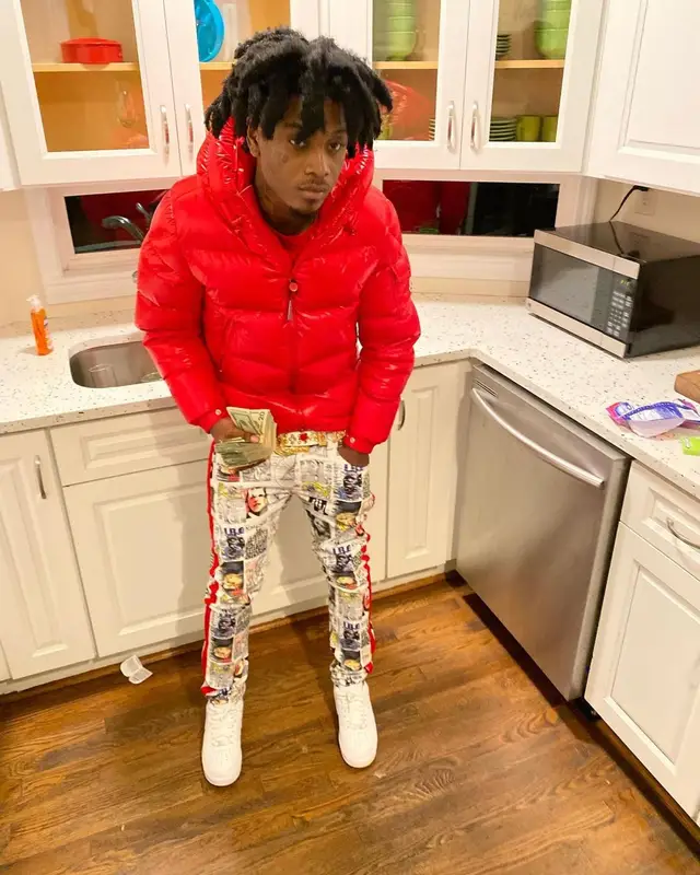 Jdot Breezy outfit in Moncler, Decibel, and Nike, 2021