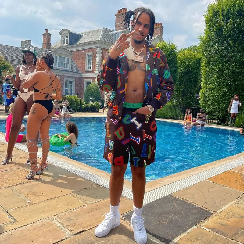 AJ Tracey outfit in Louis Vuitton, NBA, and Calvin Klein, 2021