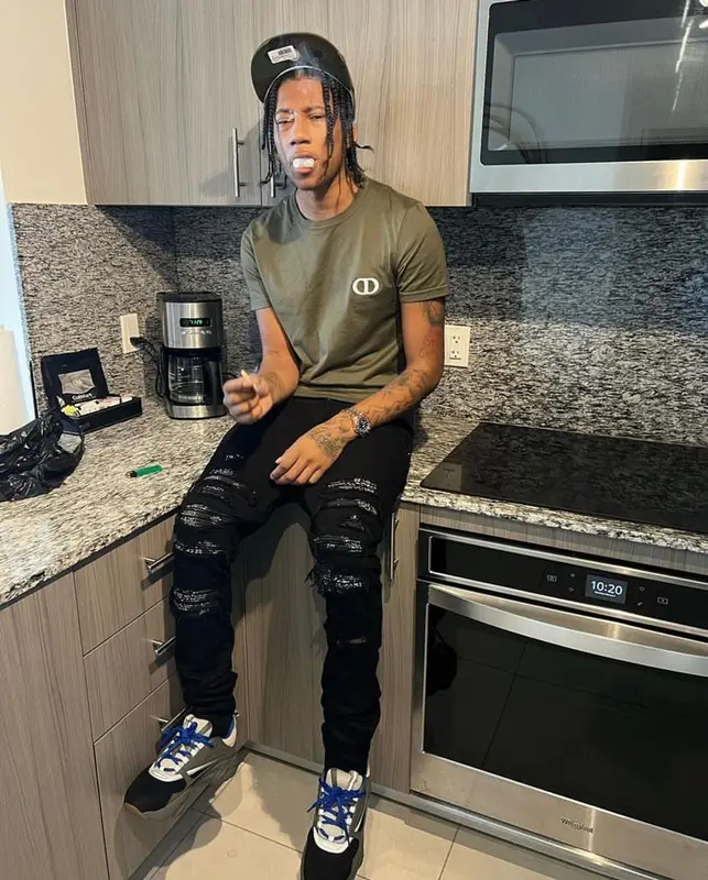 Digga D outfit in Dior and Amiri, 2022