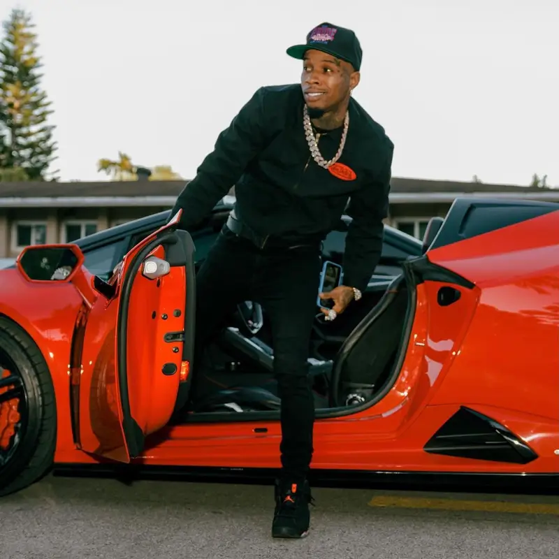 Tory Lanez outfit in Von Dutch, Amiri, and Rhude, 2022