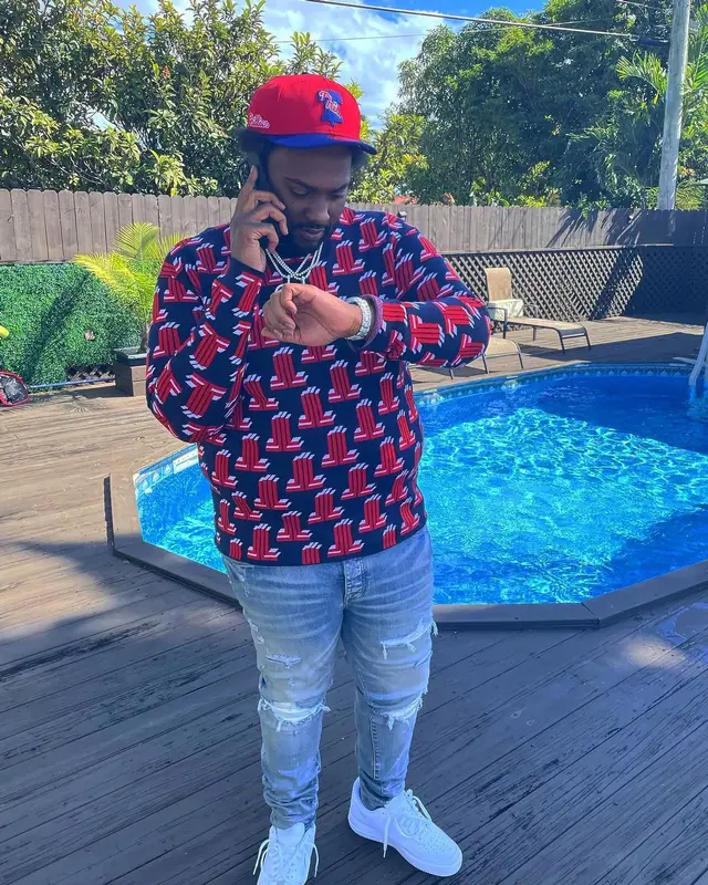 Peezy outfit in Lanvin, Amiri, and New Era, 2022