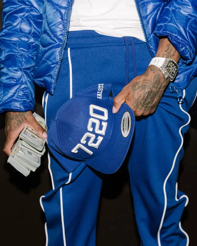 Lil Durk outfit in Louis Vuitton, Hanes, and Amiri, 2022