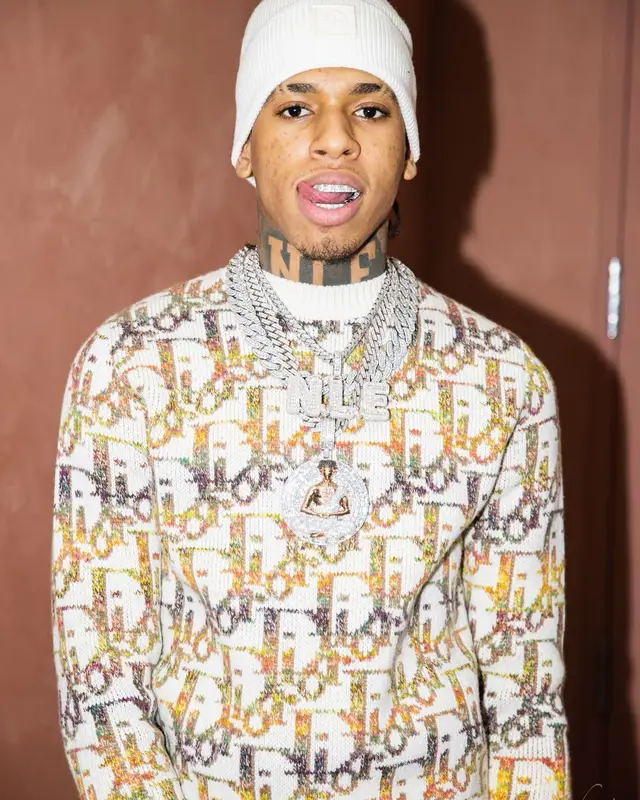 NLE Choppa outfit in Dior, Monfrere, and Moose Knuckles, 2022