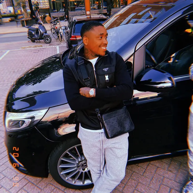 Steven Bergwijn outfit in Prada, Fear of God, and Louis Vuitton, 2021