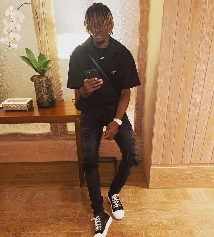 Wilfried Zaha outfit in Prada, Amiri, and Louis Vuitton, 2022