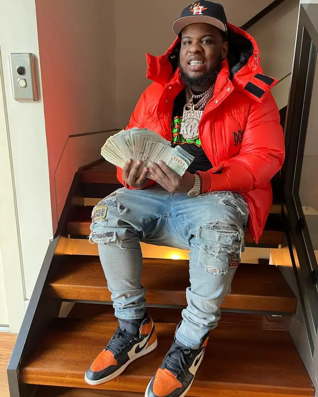 Maxo Kream outfit in Amiri, Travis Scott Merch, and New Era, 2022