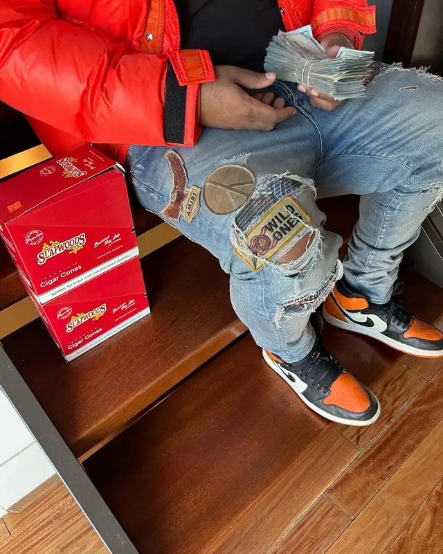 Maxo Kream outfit in Amiri, Travis Scott Merch, and New Era, 2022