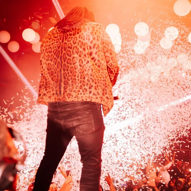 Tee Grizzley outfit in Dolce & Gabbana and Amiri, 2022