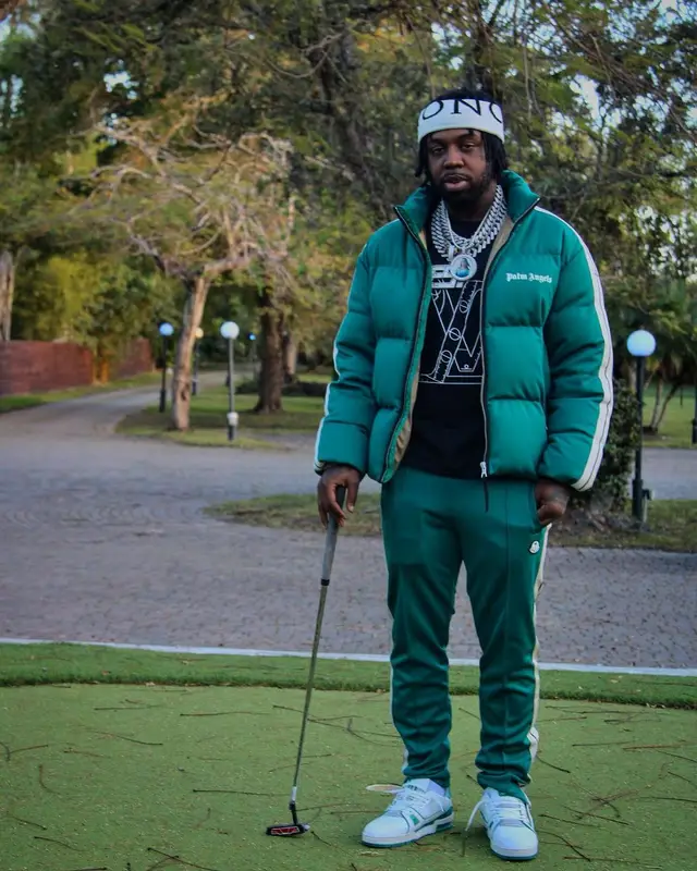 EST Gee outfit in Palm Angels, Louis Vuitton, and Moncler, 2022