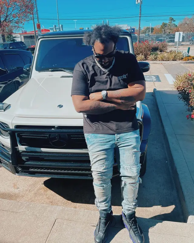 Peezy outfit in Amiri, Jordan, and Versace, 2022