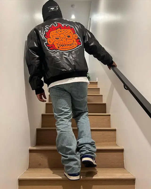 Strick outfit in Who Decides War, Nike, and Ambush, 2022