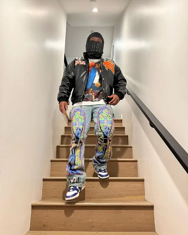 Strick outfit in Who Decides War, Nike, and Ambush, 2022