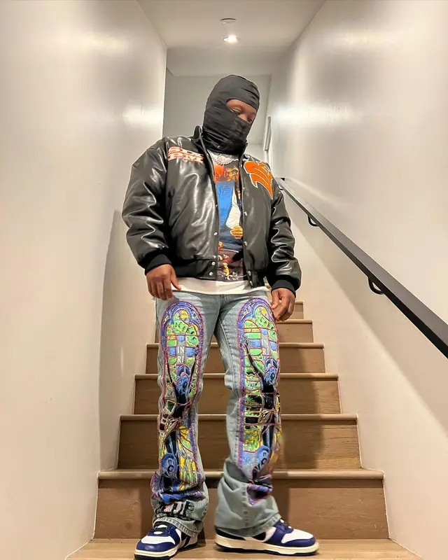 Strick outfit in Who Decides War, Nike, and Ambush, 2022