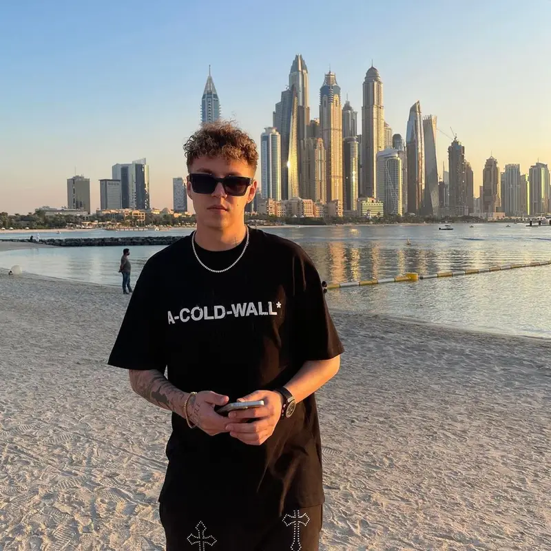 Markul outfit in A-Cold-Wall*, Hublot, and Louis Vuitton, 2022