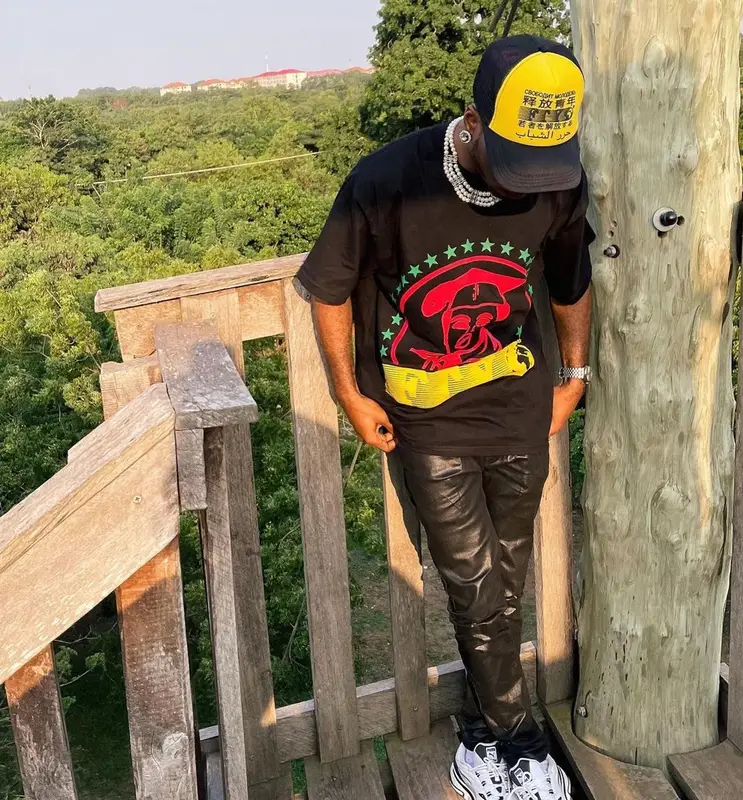 CKay outfit in Puma and Free The Youth, 2020