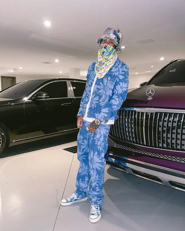 Tyga outfit in Marc Jacobs, Bape, and Pale, 2022
