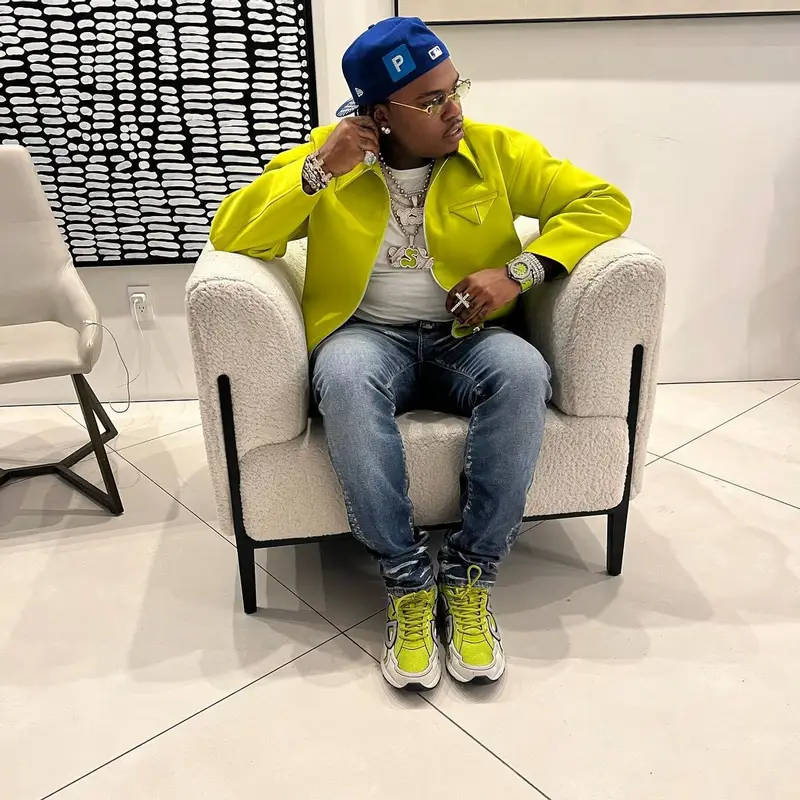 Gunna outfit in Bottega Veneta, Purple Brand, and Dior, 2022