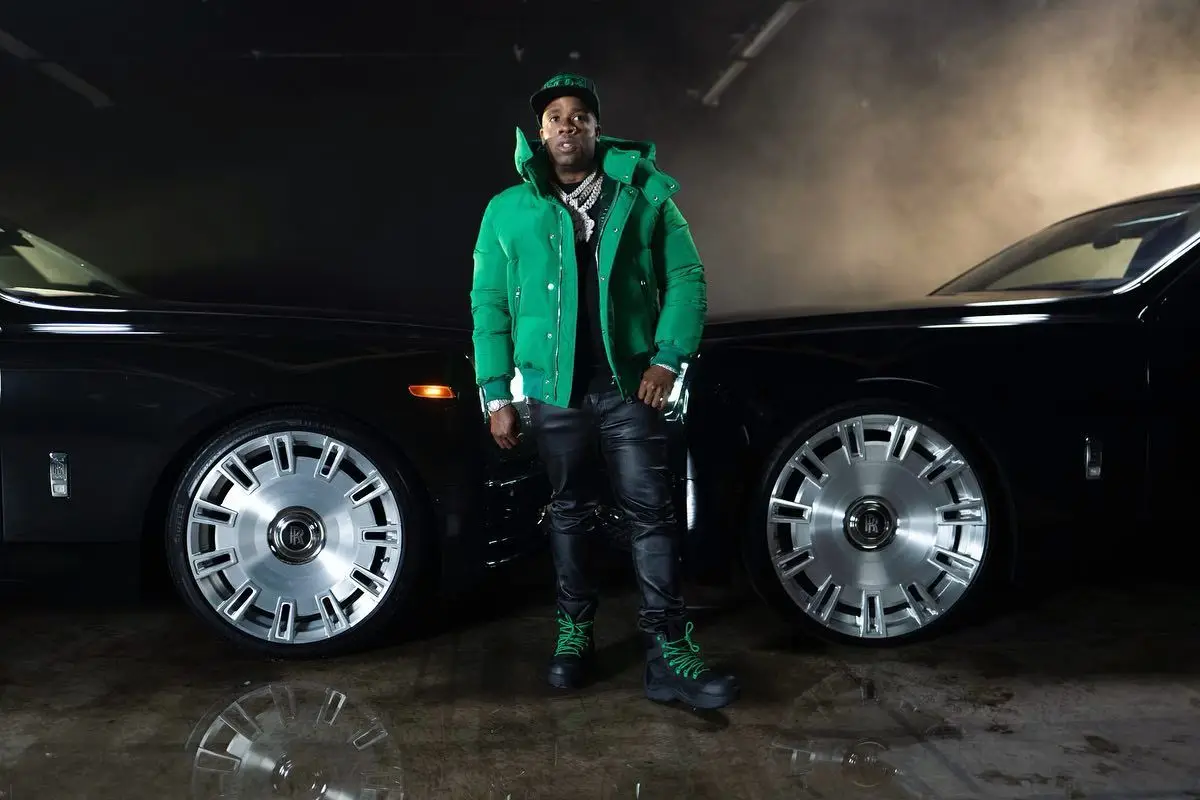 Yo Gotti outfit in Alexander McQueen, Amiri, and Chrome Hearts, 2022