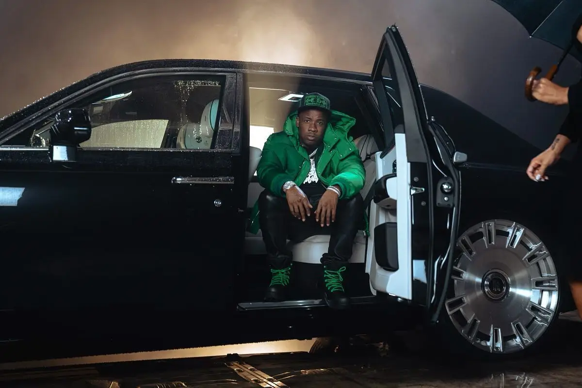 Yo Gotti outfit in Alexander McQueen, Amiri, and Chrome Hearts, 2022