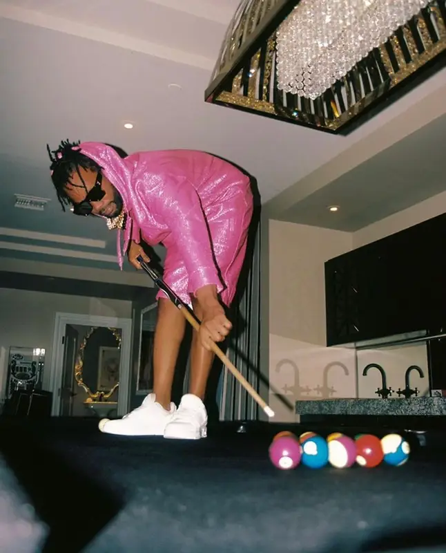 Juicy J outfit in Valentino and Louis Vuitton, 2022