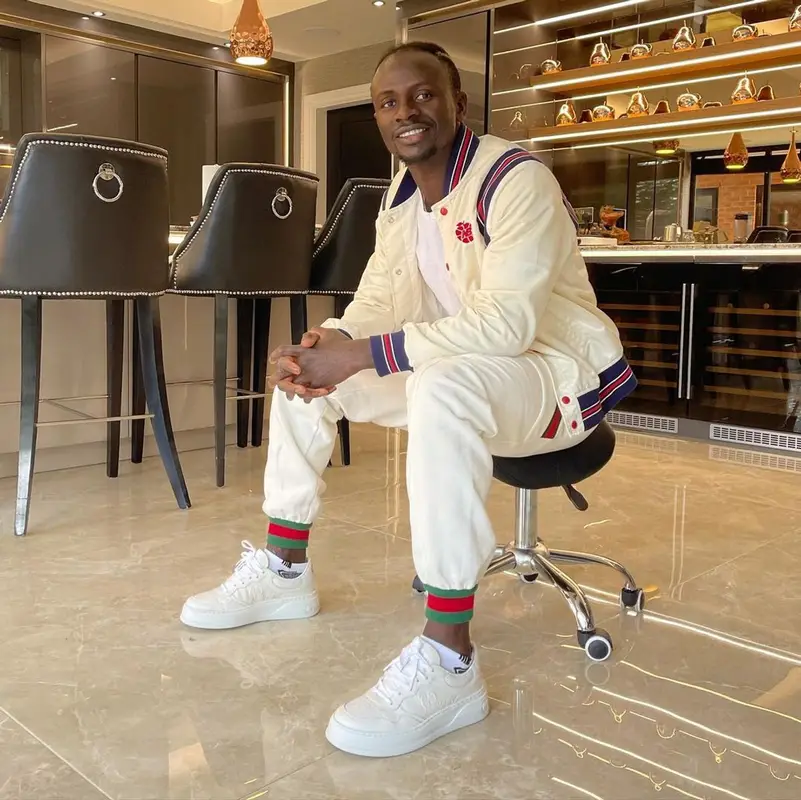 Sadio Mane outfit in New Balance, Gucci, and Aime Leon Dore, 2021