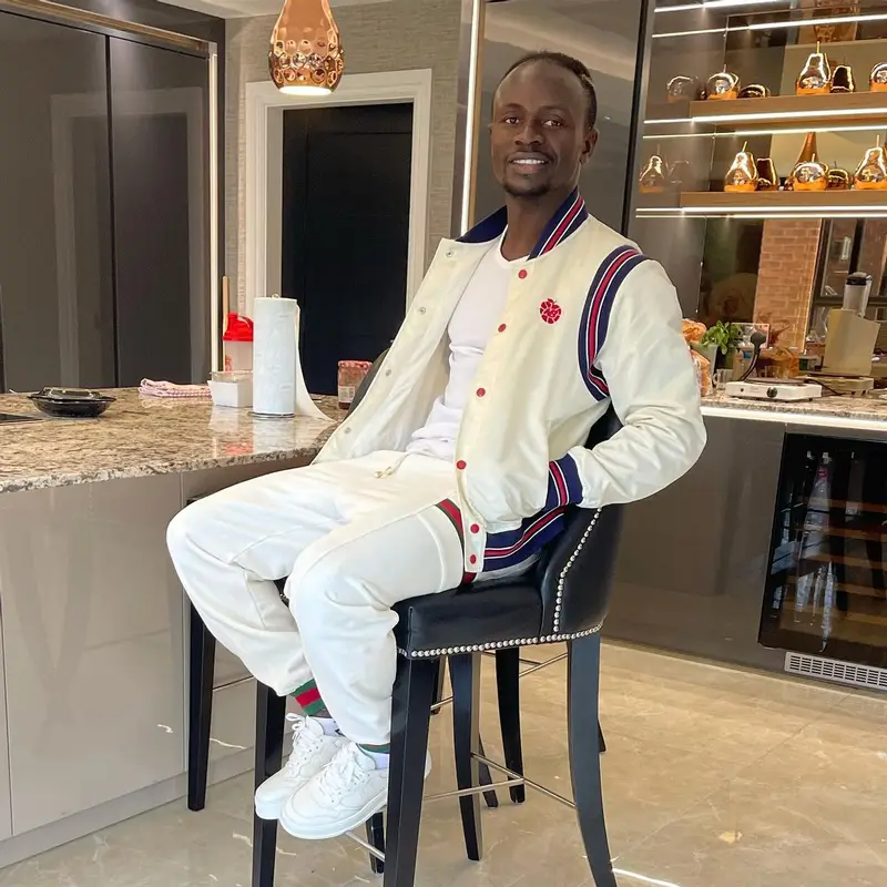 Sadio Mane outfit in New Balance, Gucci, and Aime Leon Dore, 2021