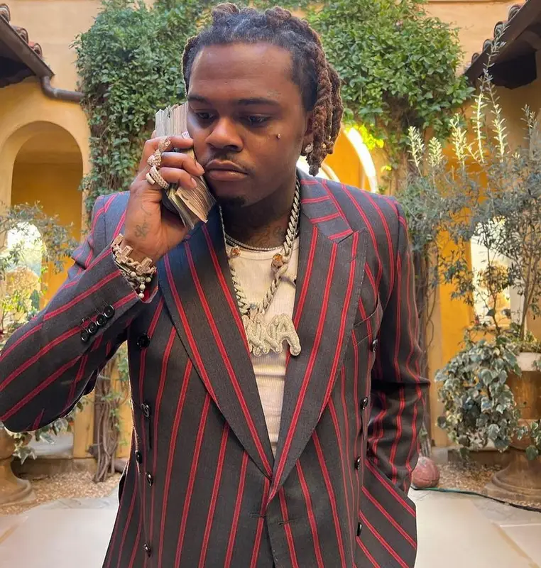 Gunna outfit in Dolce & Gabbana, Dita, and Prada, 2022