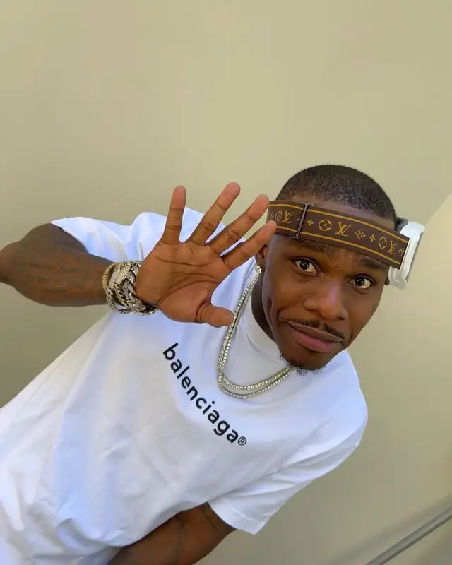 DaBaby outfit in Balenciaga, Amiri, and Louis Vuitton, 2022