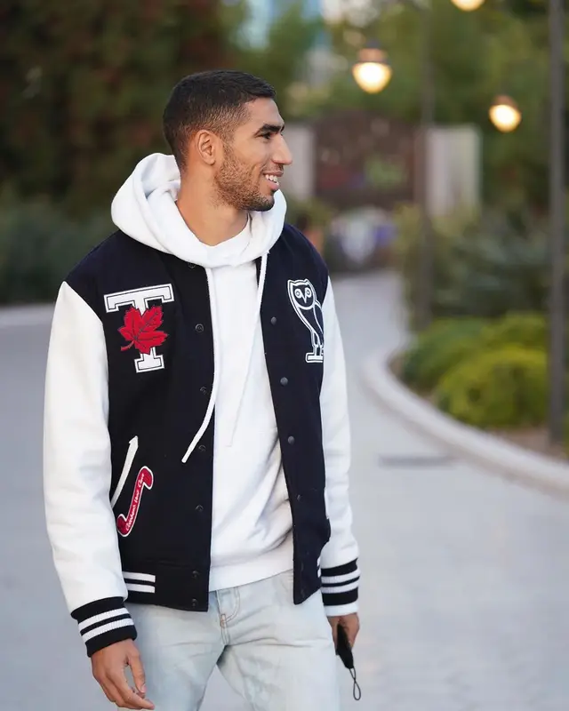 Achraf Hakimi outfit in OVO, Off-White, and University of Toronto Varsity, 2021