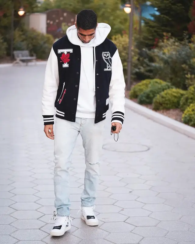 Achraf Hakimi outfit in OVO, Off-White, and University of Toronto Varsity, 2021