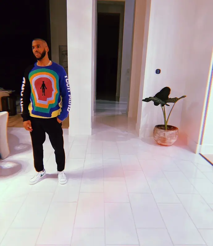 Chris Paul outfit in The Elder Statesman, Nike, and Illesteva, 2022
