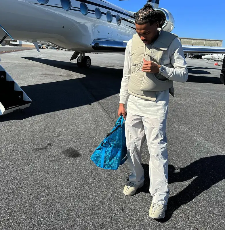 Lil Baby outfit in Post Archive Faction, Jordan, and Louis Vuitton, 2022